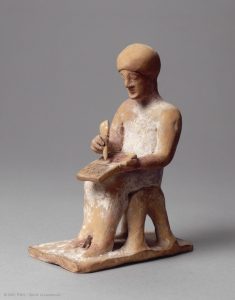 Writing in the Ancient World - seated scribe